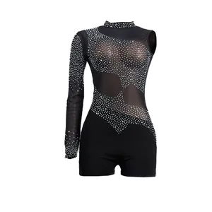 Pagliaccetto nero sexy in rete con strass scintillanti per serate trendy in discoteca.