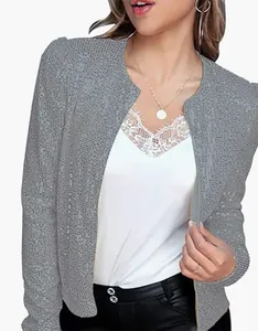 Detail of women's grey sequin short jacket with elegant lace inner top