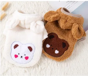 Close-up of soft plush pet hoodies with cute bear ears and bear embroidery
