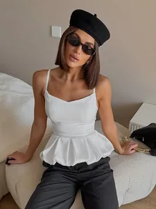 Elegant white satin peplum camisole top for a chic summer look
