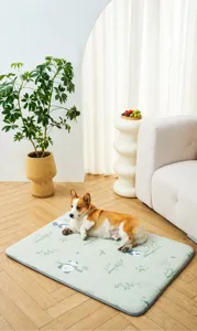 Detailed lifestyle view of the panda-patterned cooling pet mat with a dog lying on it