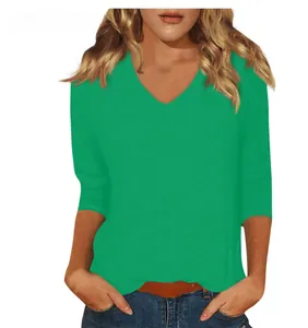 Stylish women's casual V-neck 3/4 sleeve T-shirt in a vibrant solid green color finish