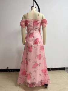 Detailed back view of a French vintage floral print off-the-shoulder pink maxi dress