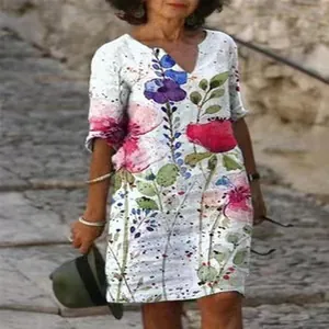 Vintage bohemian floral print V-neck dress with loose fit and comfortable 3/4 sleeves