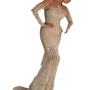 Elegant gold sequin evening gown with a slim bodycon fit and sparkling tube top design
