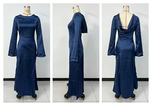Elegant navy blue satin long sleeve maxi dress with backless design and flare sleeves.