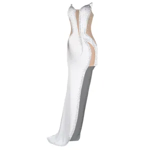 Detail showing white mesh evening dress with elegant rhinestones and sexy cut-outs