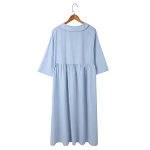 Back view of a casual light blue cotton linen loose dress featuring a Peter Pan collar