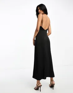 Back view of a sleek black satin long slip dress for elegant evening occasions