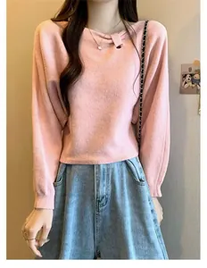 Elegant soft pink knit sweater featuring an asymmetrical pleated neckline and batwing sleeves