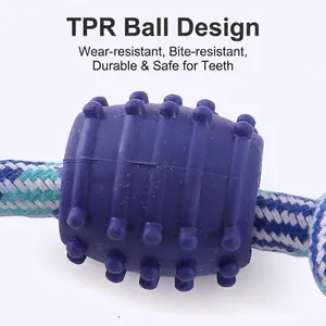 Durable double knot cotton rope dog toy featuring a textured blue TPR ball for aggressive chewers