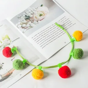 Colorful interactive plush cat toy string with persimmon shaped balls and a ringing bell