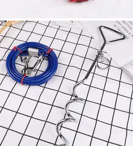 Detailed view of heavy-duty chrome spiral dog tie-out stake with blue steel wire leash