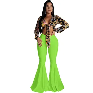 Sexy two-piece set with Baroque print tie-front crop top and neon green flare pants