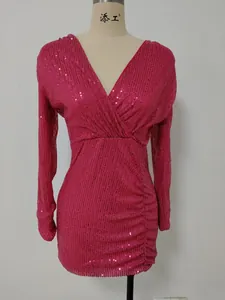 Exquisite detail of fuchsia sequin long-sleeve V-neck ruched nightclub mini dress