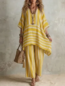 Dettaglio completo del set a due pezzi in lino a righe gialle e bianche stile boho