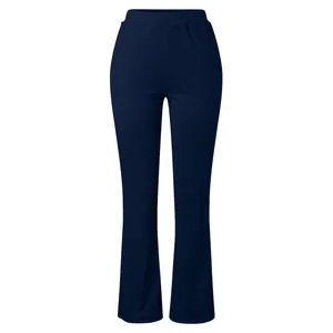 Detail view of women's high-waist tummy control yoga pants with a stylish flared leg cut