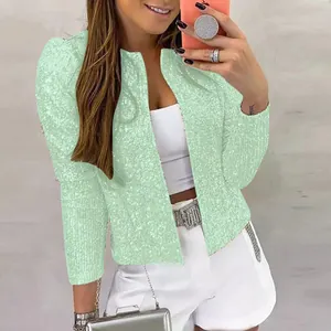 Detail of fashionable mint green sequin short jacket with standing collar for spring