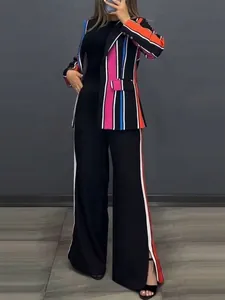 Elegant women's two-piece suit featuring a colorful striped blazer and black wide-leg pants