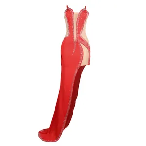 Elegant red evening gown featuring sexy sheer mesh panels and sparkling rhinestone accents