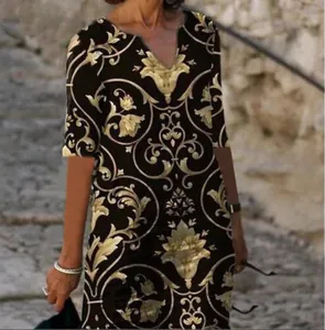 Detail of vintage baroque floral print V-neck dress with half sleeves on model