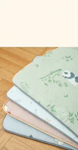Close-up of four breathable pet floor mats with cute animal and floral patterns