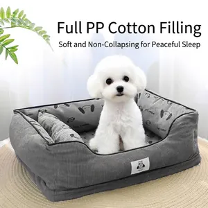 Comfortable gray corduroy dog bed sofa with plush PP cotton filling for small dogs.
