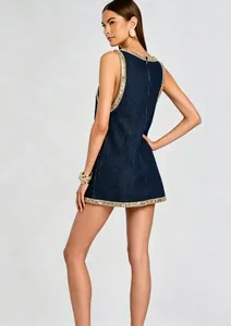 Elegant detailed back view of sleeveless denim mini dress with sparkling rhinestone trim