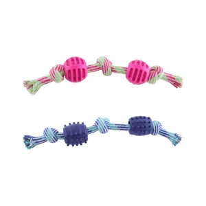 Durable cotton rope dog toy with double knots and textured rubber balls for chewing and play