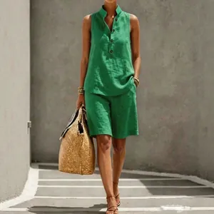 Elegant green sleeveless button-up linen top and matching shorts two-piece set for women