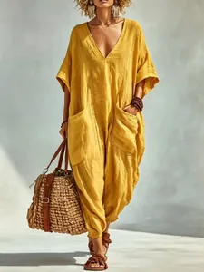 Bohemian style loose yellow linen jumpsuit for women featuring V-neck and large pockets