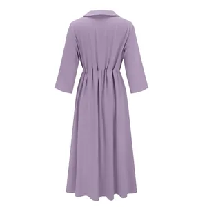 Back view of a casual lavender cotton linen dress with waist shirring detail