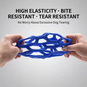 Durable blue hollow TPR dog toy being stretched to show high elasticity and bite resistance
