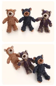 Detailed view of three colorful plush beggar bear dog toys with textured fabric