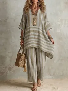 Completo due pezzi con tunica a righe scollo a V e pantaloni a gamba larga