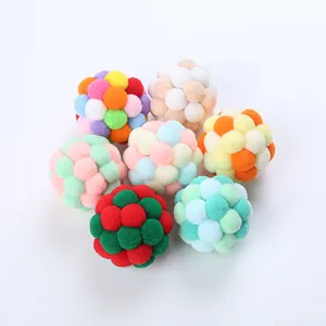 Colorful handmade plush cat toy balls with soft pom-pom texture