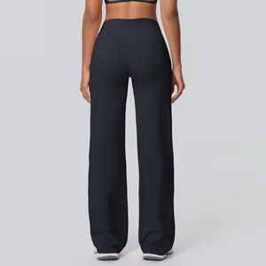Detail back view of black high-waisted yoga flare pants with soft brushed fabric.