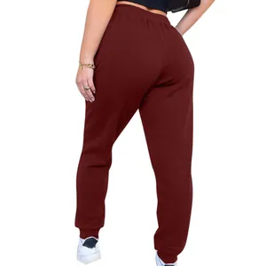 Rear view of comfortable women's burgundy high-waisted joggers in a soft cotton fabric