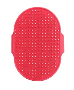 Red oval silicone pet bath brush with soft massage bristles and side grips for grooming