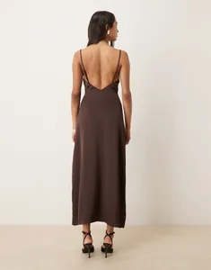 Detailed back view of chocolate brown satin slip dress featuring deep V-back and thin straps