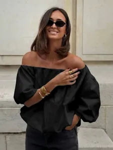 Elegant black off-the-shoulder puff sleeve cotton blouse for trendy summer styling