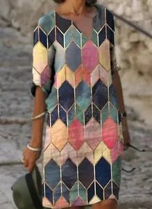 Close-up of a vintage abstract geometric print V-neck midi dress with half sleeves.