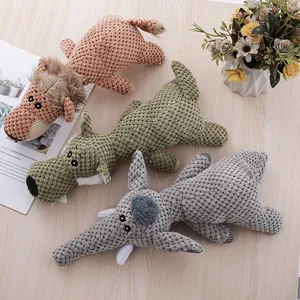 Close-up of textured corn kernel plush dog toys in lion, donkey, and elephant shapes