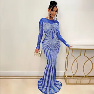 Detailed view of royal blue floor-length evening dress with shimmering silver rhinestones