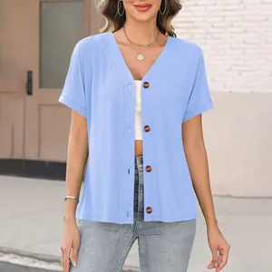 Close-up of light blue short-sleeved v-neck cardigan with brown button details