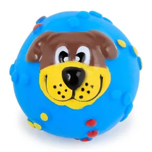 Squeaky blue vinyl dog toy ball featuring a cute puppy face and textured massage nubs