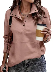 Detail of women's mauve long sleeve sweatshirt with button collar and pocket