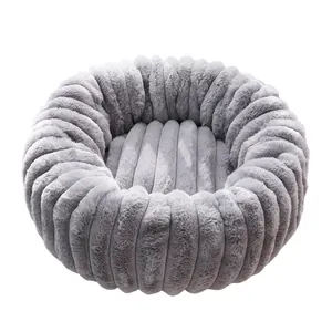 Cozy grey round plush pet bed with thick winter insulation for small cats and dogs