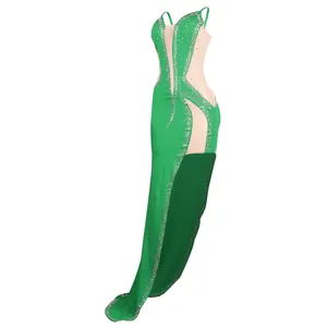 Detailed side view of a sexy green evening gown featuring sheer mesh and rhinestone embellishments