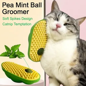 Close-up of the textured surface and catnip ball of the pea-shaped cat groomer